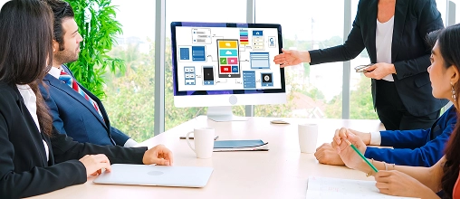 Core Web Vitals Meeting Photo BrandLoom team reviewing Manappuram’s performance metrics to improve Core Web Vitals and site speed.
