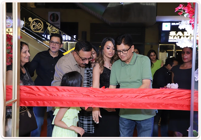 Ribbon cutting ceremony at the grand opening of Diya Sharma Makeup & Hair Studio Ribbon cutting ceremony at the grand opening of Diya Sharma Makeup & Hair Studio