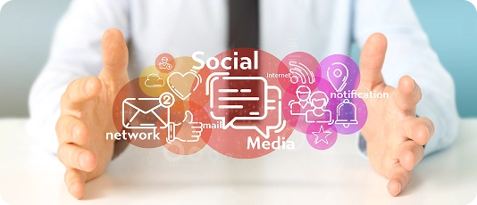 brandloom-multichannel-rollout-social-icons Hands holding social media and engagement icons representing BrandLoom’s multichannel employer brand rollout.