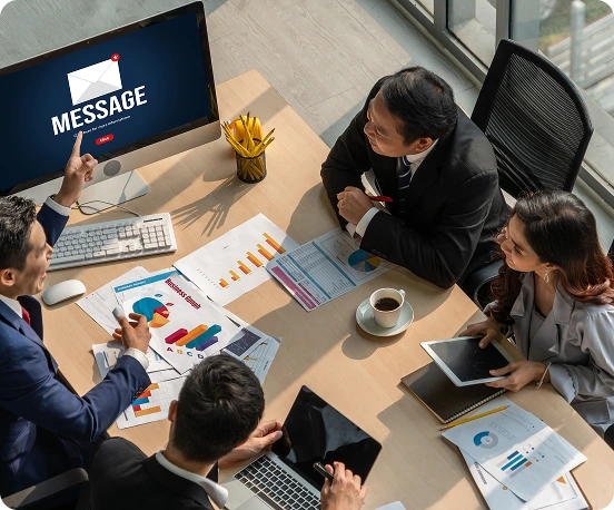 brandloom-email-campaign-design BrandLoom team planning and analyzing an email marketing campaign strategy for higher open rates