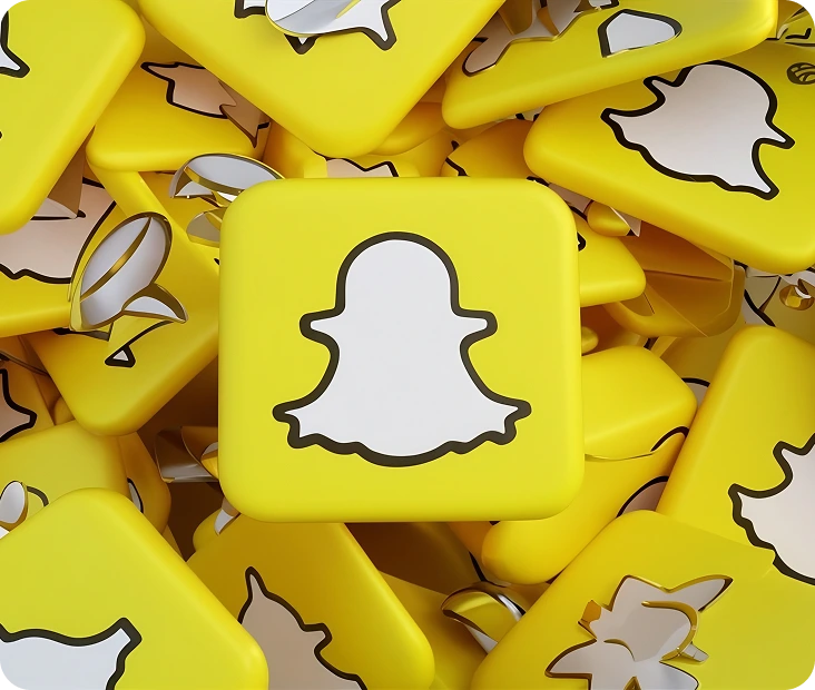Illustration of Snapchat icons representing BrandLoom Snapchat marketing strategy for driving engagement and growth Illustration of Snapchat icons representing BrandLoom Snapchat marketing strategy for driving engagement and growth
