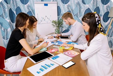 Team collaborating on Snapchat campaign strategy showing client success and performance growth Team collaborating on Snapchat campaign strategy showing client success and performance growth