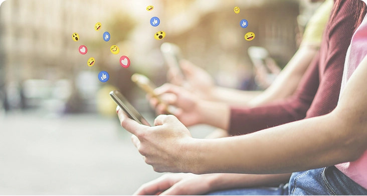 Audience Expansion and Retargeting Strategy Users engaging on mobile devices representing display advertising audience expansion and re-engagement campaigns