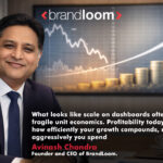 Business leader with growth chart highlighting marketing efficiency and unit economics